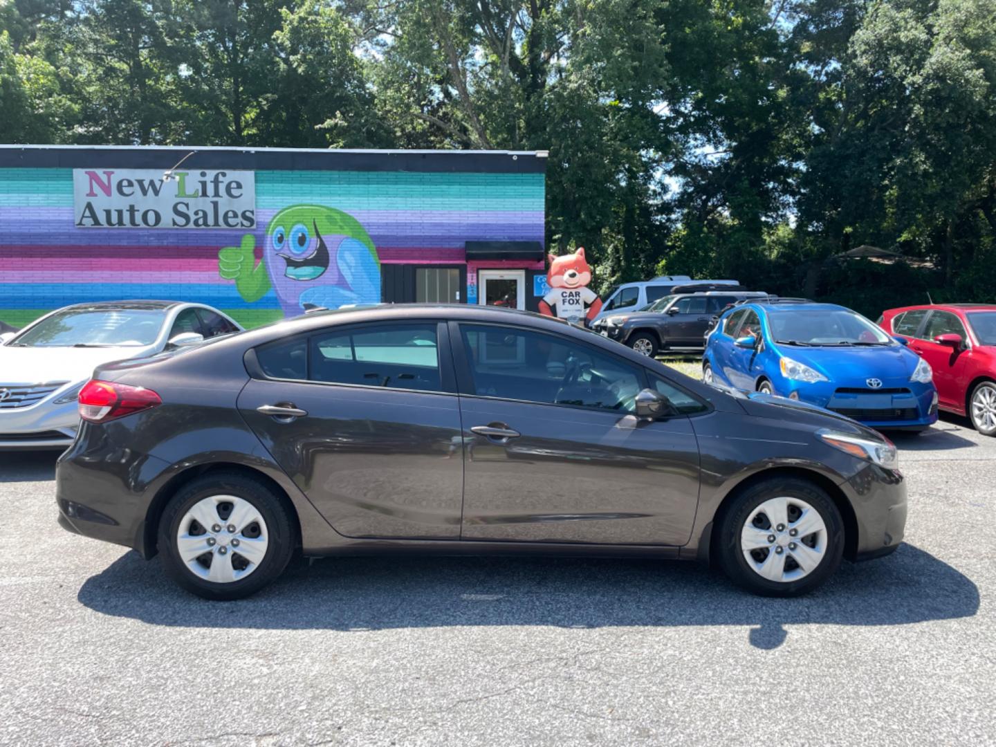 2017 BROWN KIA FORTE LX (3KPFK4A75HE) with an 2.0L engine, automatic transmission, located at 5103 Dorchester Rd., Charleston, SC, 29418-5607, (843) 767-1122, 36.245171, -115.228050 - Local Trade-in with clean interior, CD/AUX/USB/Sat, Hands-free Phone, Power Windows, Power Locks, Power Mirrors, Keyless Entry. 99k miles! Located at New Life Auto Sales! 2023 WINNER for Post & Courier's Charleston's Choice Pre-owned Car Dealer AND 2018-2024 Top 5 Finalist for Charleston City Paper - Photo#7